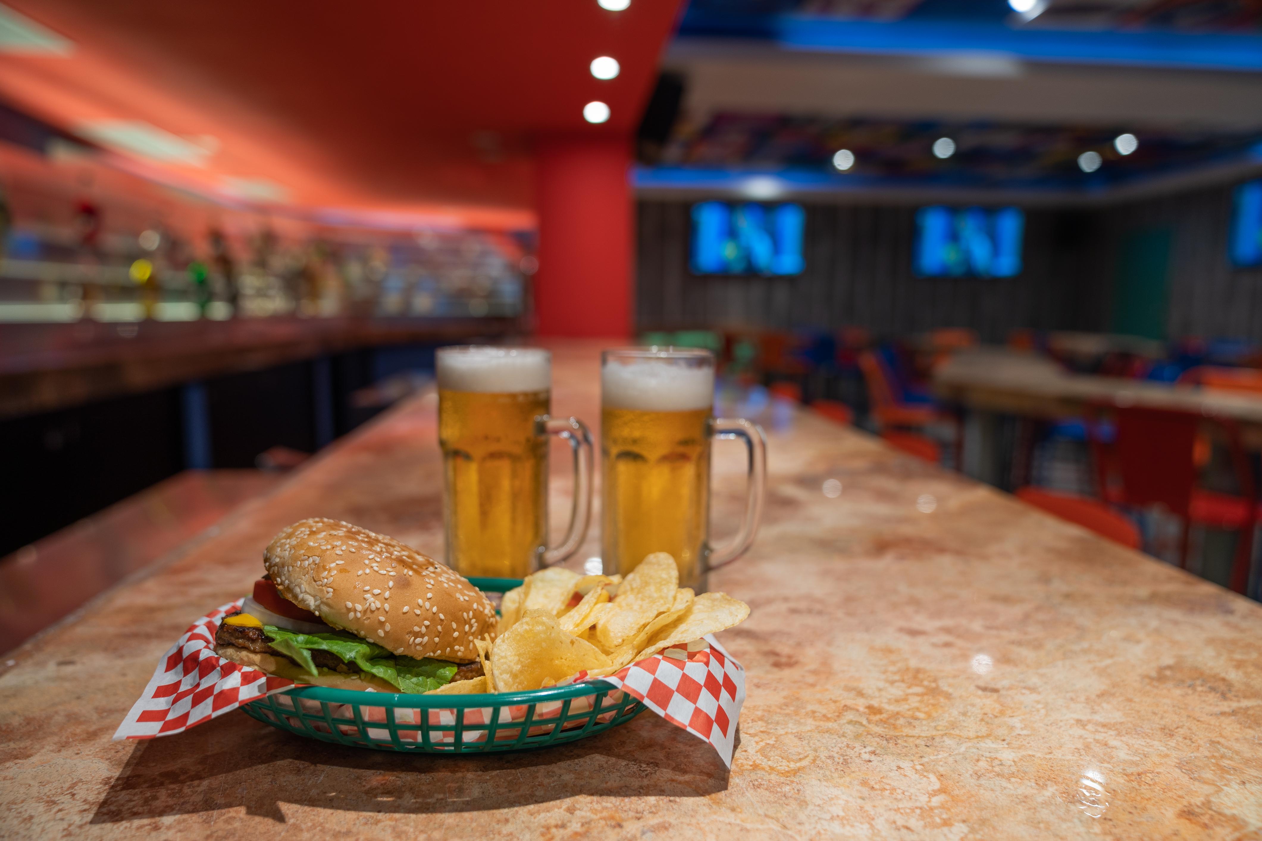 Grand Park Royal Puerto Vallarta - All Inclusive Esterno foto A hamburger and chips with two beers